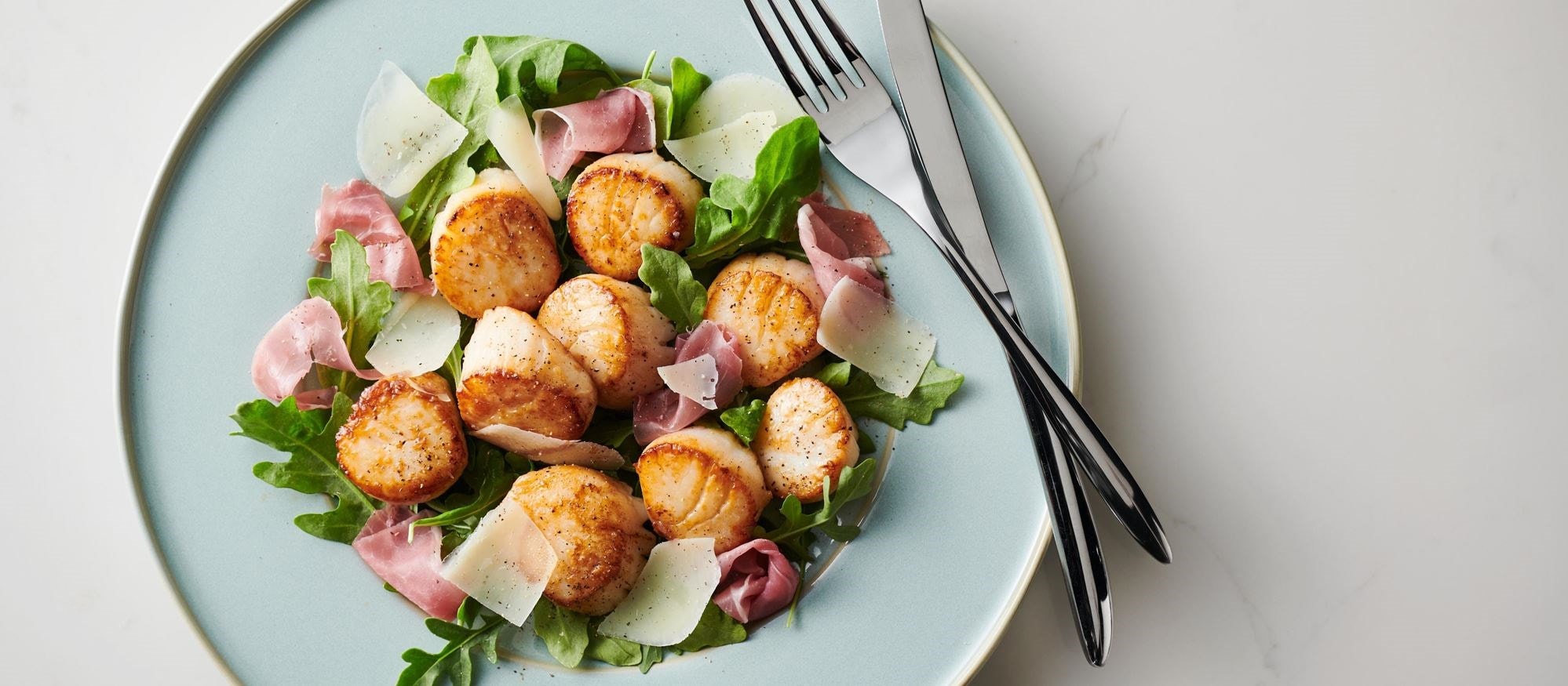 Easy and delicious Scallops recipe using the Griddle Mode setting of your Wolf Dual Fuel Range