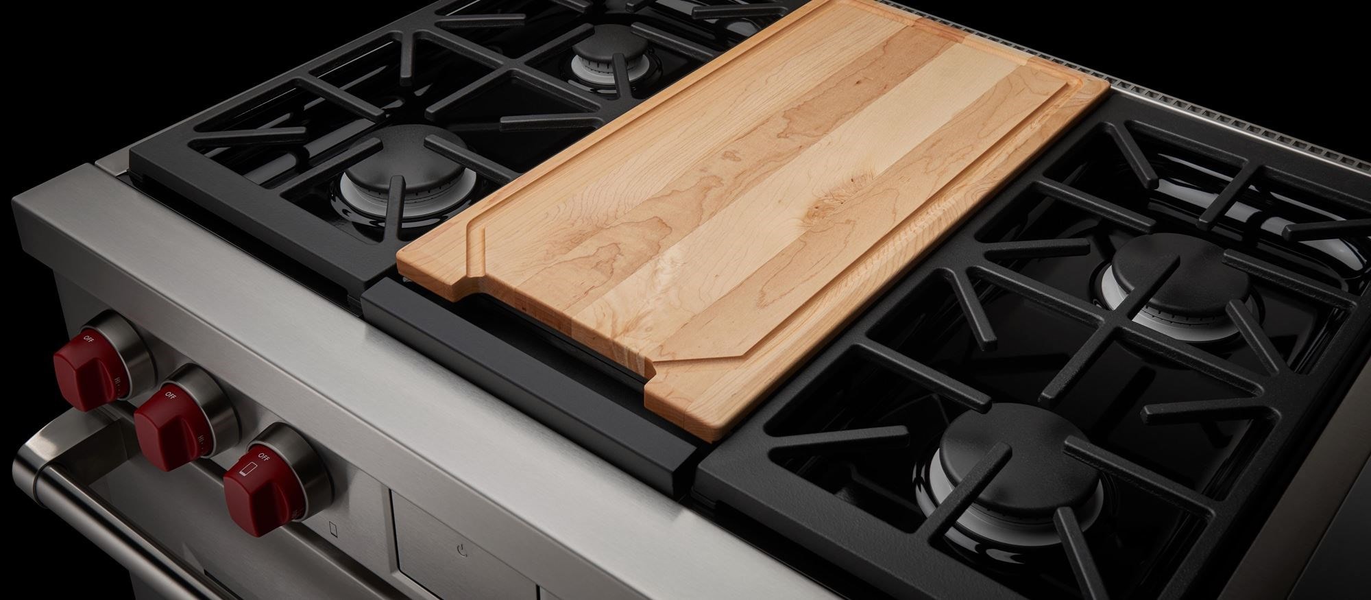Wolf 36" Dual Fuel Range (DF36450G) shown with custom cutting board.