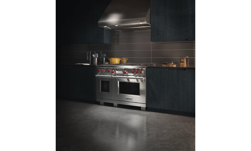 Wolf Dual Fuel Range and Pro Wall Hood featured at Food is Art International