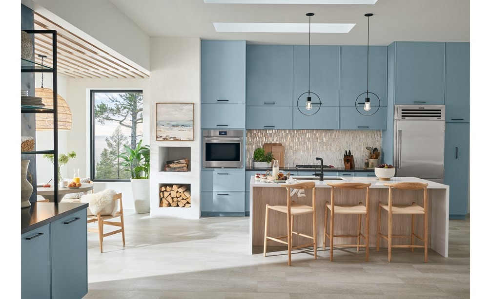 Custom Kitchen Design featuring Sub-Zero, Wolf, and Cove kitchen appliances set in modern slim shaker, denim and Swiss cabinetry