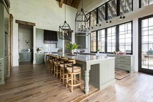 Bayfront Rustic Hideaway kitchen by Erika Powell is a warm, welcoming backdrop for future guests.