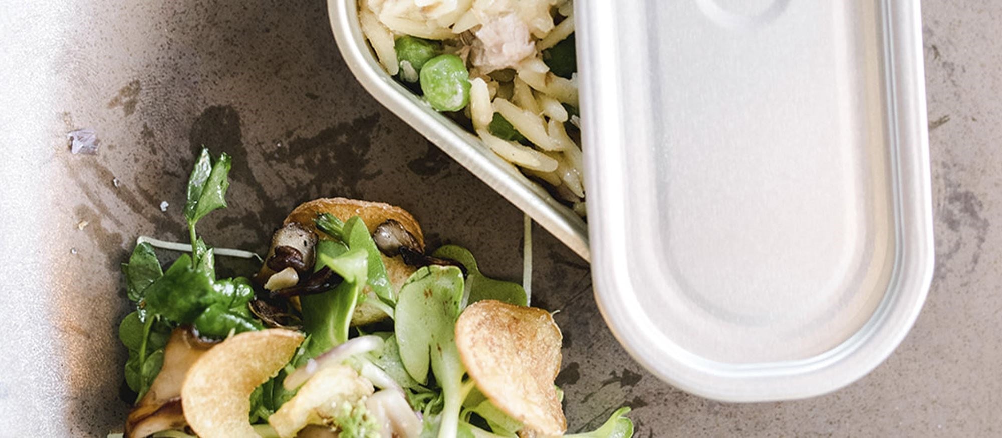 Some of the dishes that delighted Paranjape's guests included (clockwise from left:) Tuna Confit, Hangar Steak with Black Asparagus, and Bread Salad with Sherry Glazed Pork Belly.