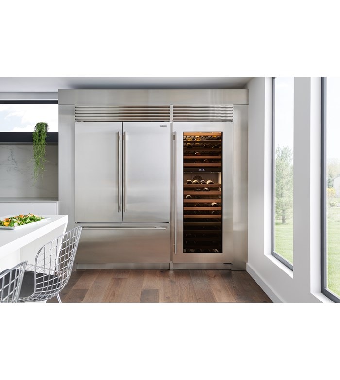 Sub-Zero 48" Classic French Door Refrigerator Freezer shown in a timeless European kitchen design displaying a Sub-Zero 30" Classic Wine Storage featuring 146-bottle capacity.