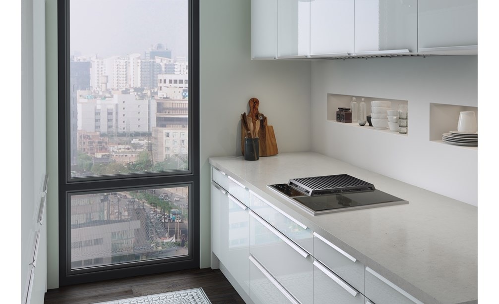 The Wolf 15" Transitional Induction Cooktop (CI152TF/S) displayed in a clean bright minimalist kitchen design space