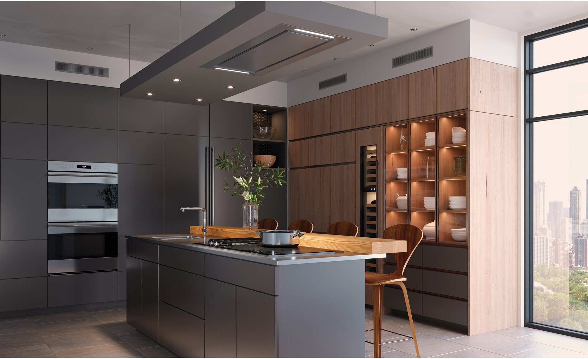 The Wolf 36" Transitional Framed Induction Cooktop (CI365TF/S) shown with Wolf 30" E Series Transitional Classic Double Oven (DO30TE/S/TH)