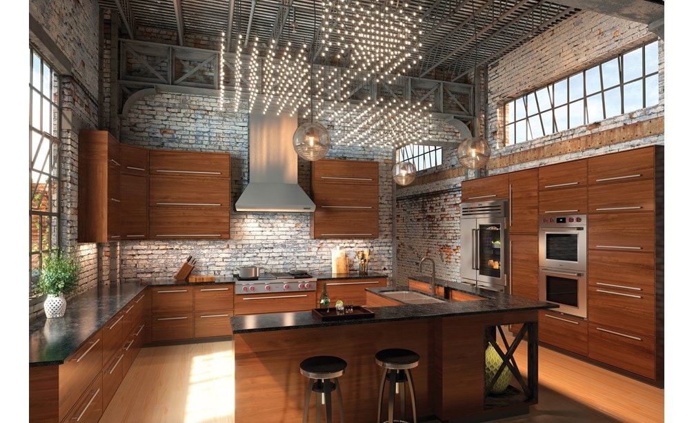 The Wolf 48" Sealed 4 Burner Rangetop Infrared Charbroiler and Griddle (SRT484CG) is timeless in this open kitchen featuring exposed brick