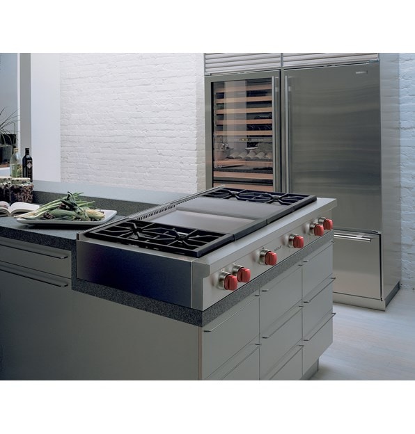 The Wolf 48" Sealed 4 Burner Rangetop Infrared Charbroiler and Griddle (SRT484CG) fits superbly into custom granite countertops. 