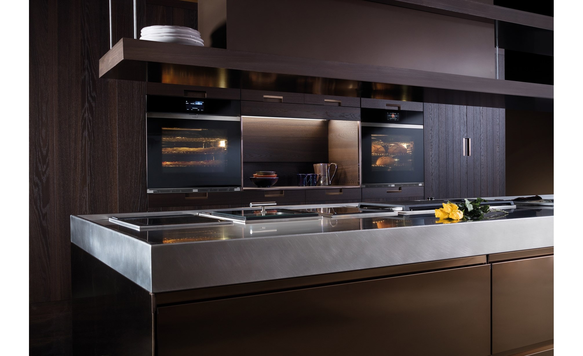 Wolf 30" M Series Contemporary Black Glass Single Oven (SO30CM/B) shown with bright halogen lights offering a clear view of your dish