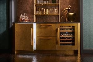 Stunning Sub-Zero 24&quot; Undercounter Beverage Center paired with 24&quot; Undercounter Wine Storage unit keeps beverages cold in any room of the house 