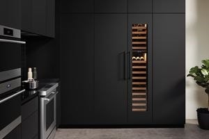 Sub-Zero Designer Series Refrigerator integrated into kitchen with black matte custom cabinetry