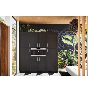 Wolf Built-In Coffee System shown installed seamlessly in black cabinetry