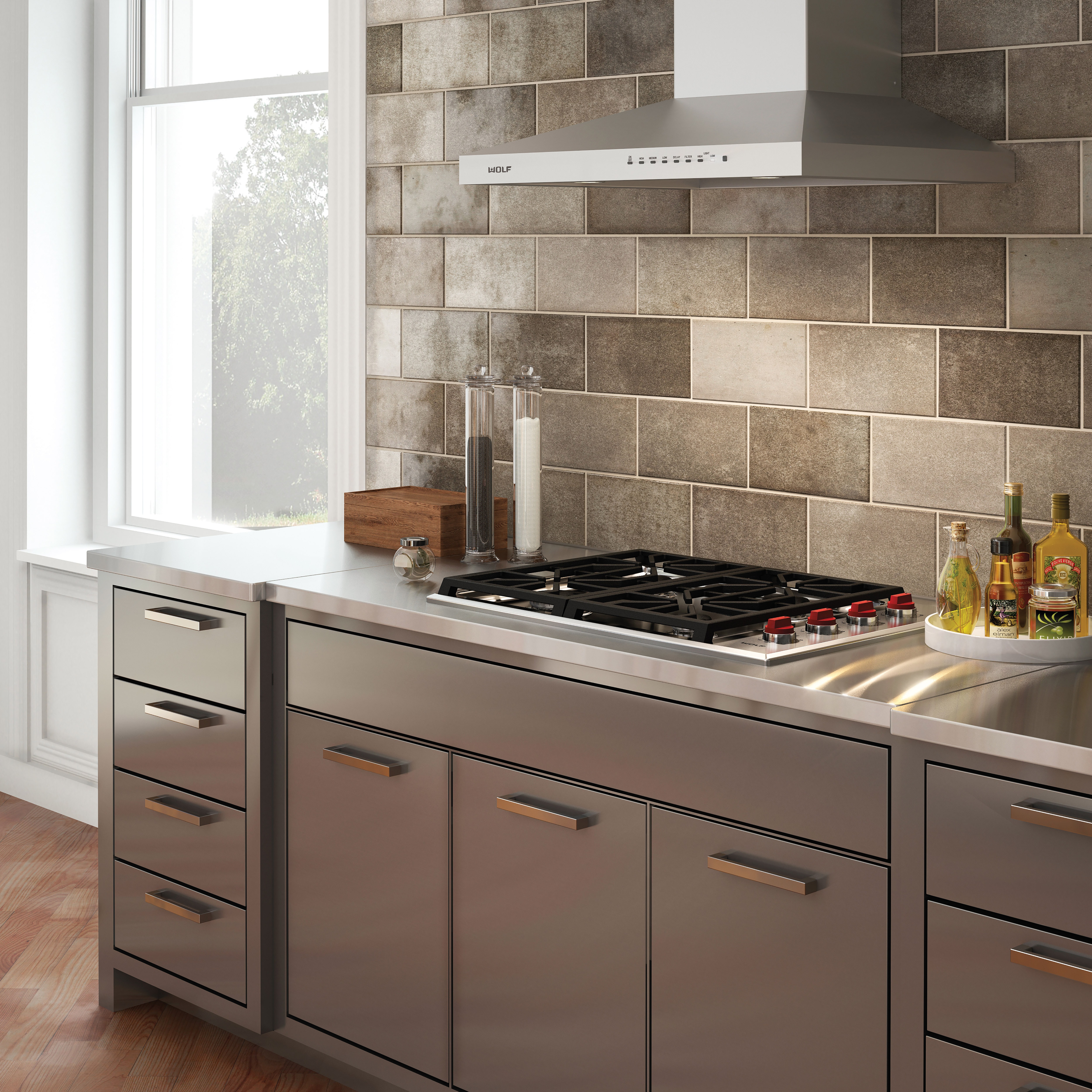 The Wolf 30" Professional Gas Cooktop 4 Burner (CG304P/S) shown paired with Wolf 30" Cooktop Wall Hood - Stainless (VW30S)