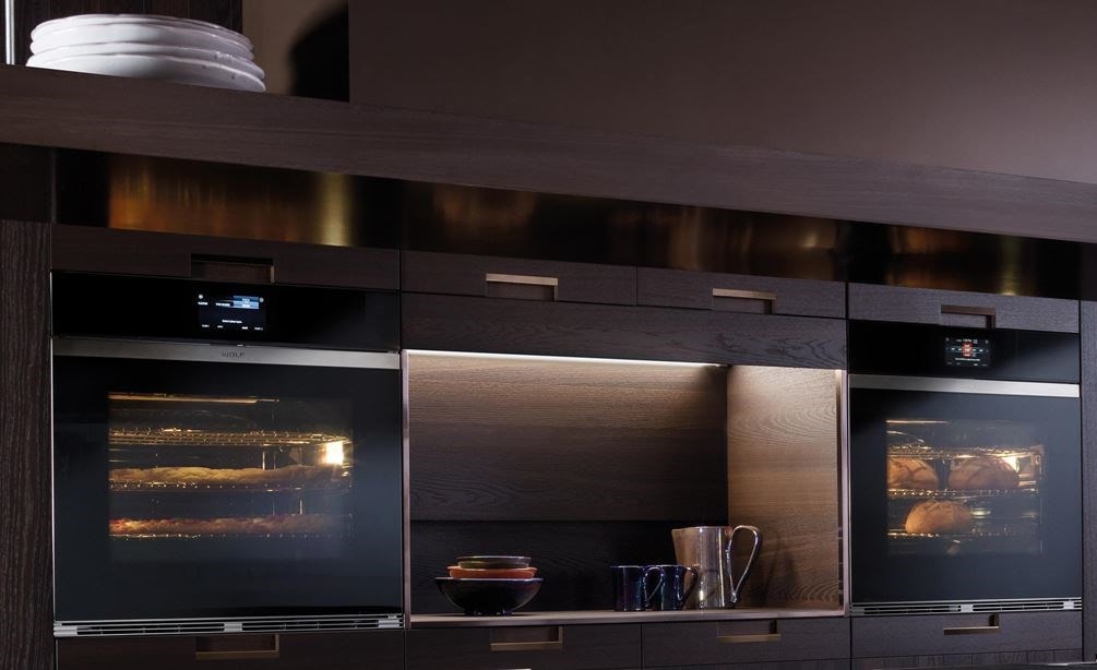 Wolf 30&quot; M Series Contemporary Black Glass Single Oven (SO30CM/B) shown with bright halogen lights offering a clear view of your dish