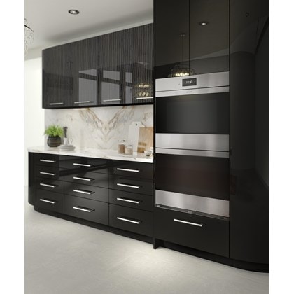The Wolf 30" M Series Contemporary Stainless Steel Double Oven (DO30CM/S) shown blending seamlessly into modern glossy kitchen cabinetry.