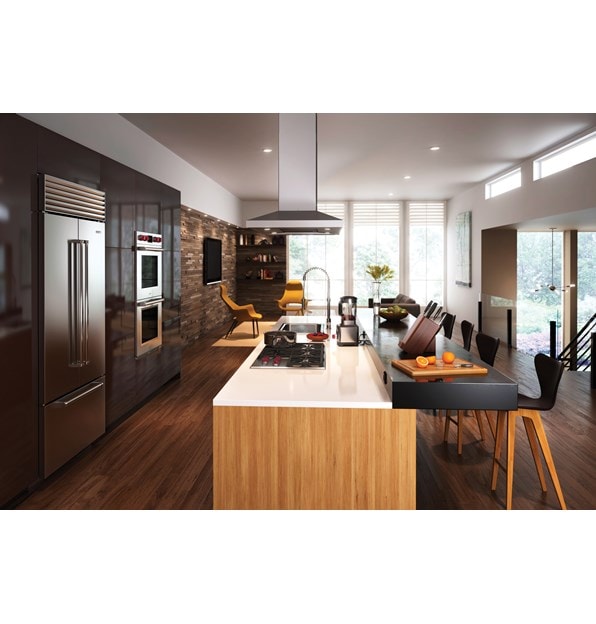 Wolf 42" Cooktop Island Hood - Stainless (VI42S) shown centered above large double tier kitchen island opposite wall of Wolf appliances