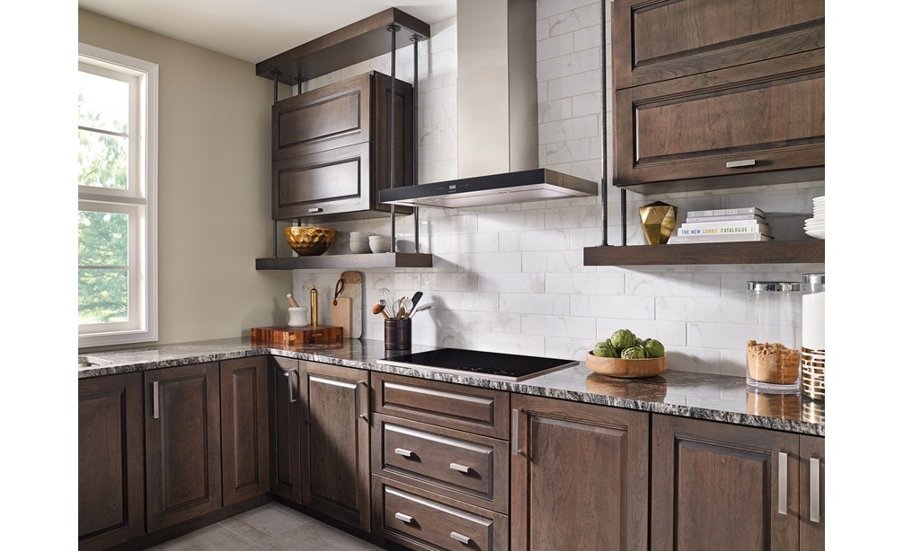The Wolf 36" Cooktop Wall Hood - Black (VW36B) shown in a charming contemporary space featuring rustic accents