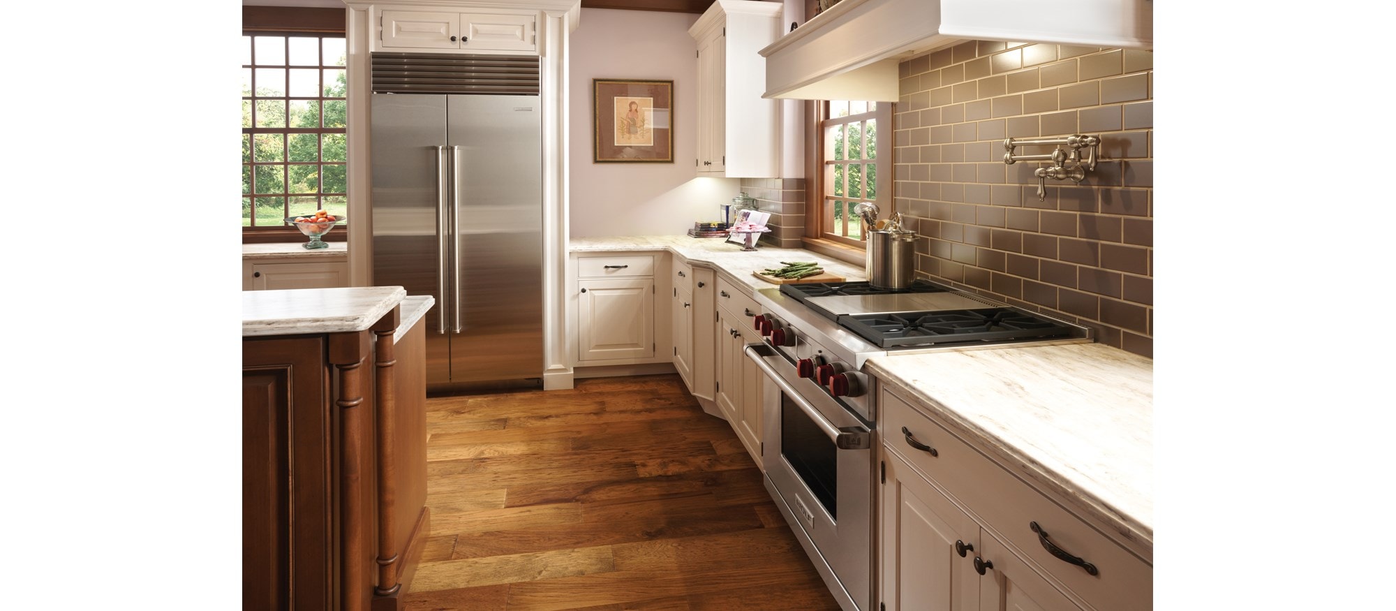 The Wolf 36" Dual Fuel Range 4 Burner Infrared Griddle (DF364G) with Sub-Zero 36" Classic Side by Side Refrigerator Freezer (BI-36S/S)