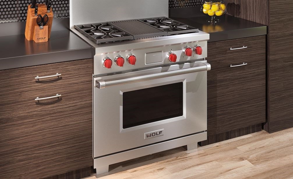 The Wolf 36&quot; Dual Fuel Range 4 Burner Infrared Charbroiler (DF364C) shown delivering state of the art cooking technology in a natural kitchen design.