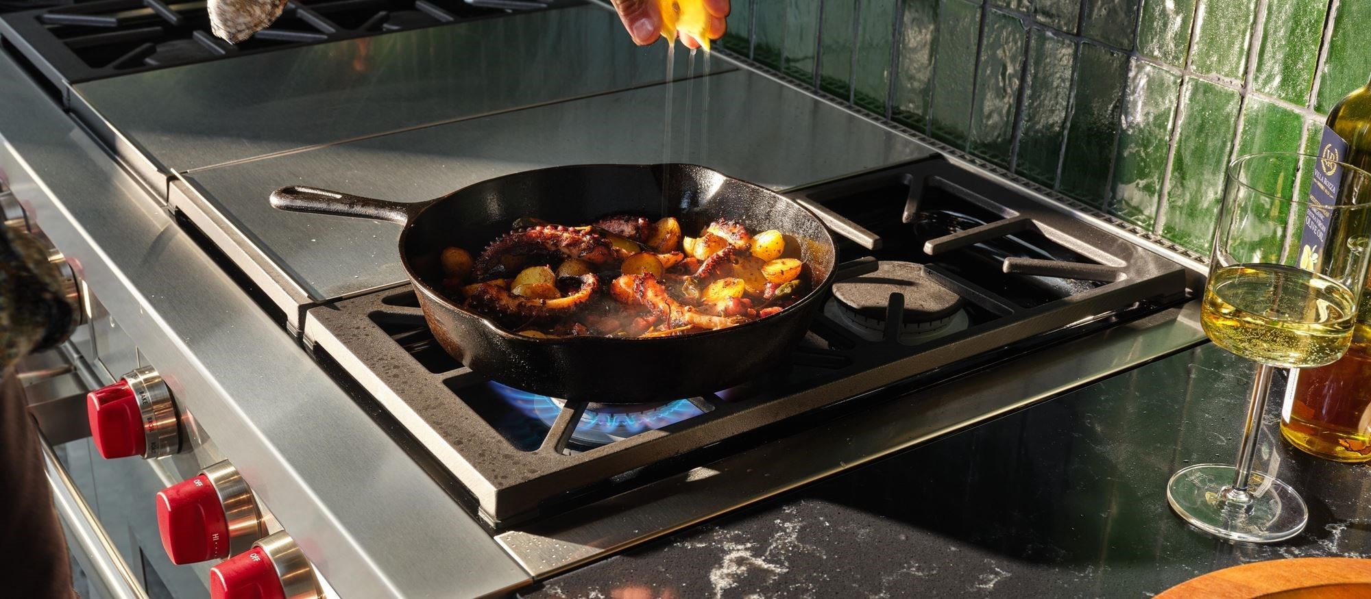 Wolf Dual Fuel Range featured searing lamb chops and sauteing cherry tomatoes with control and finesse